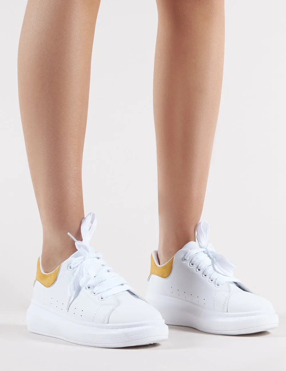 Bolt Platform Trainers in White and Yellow